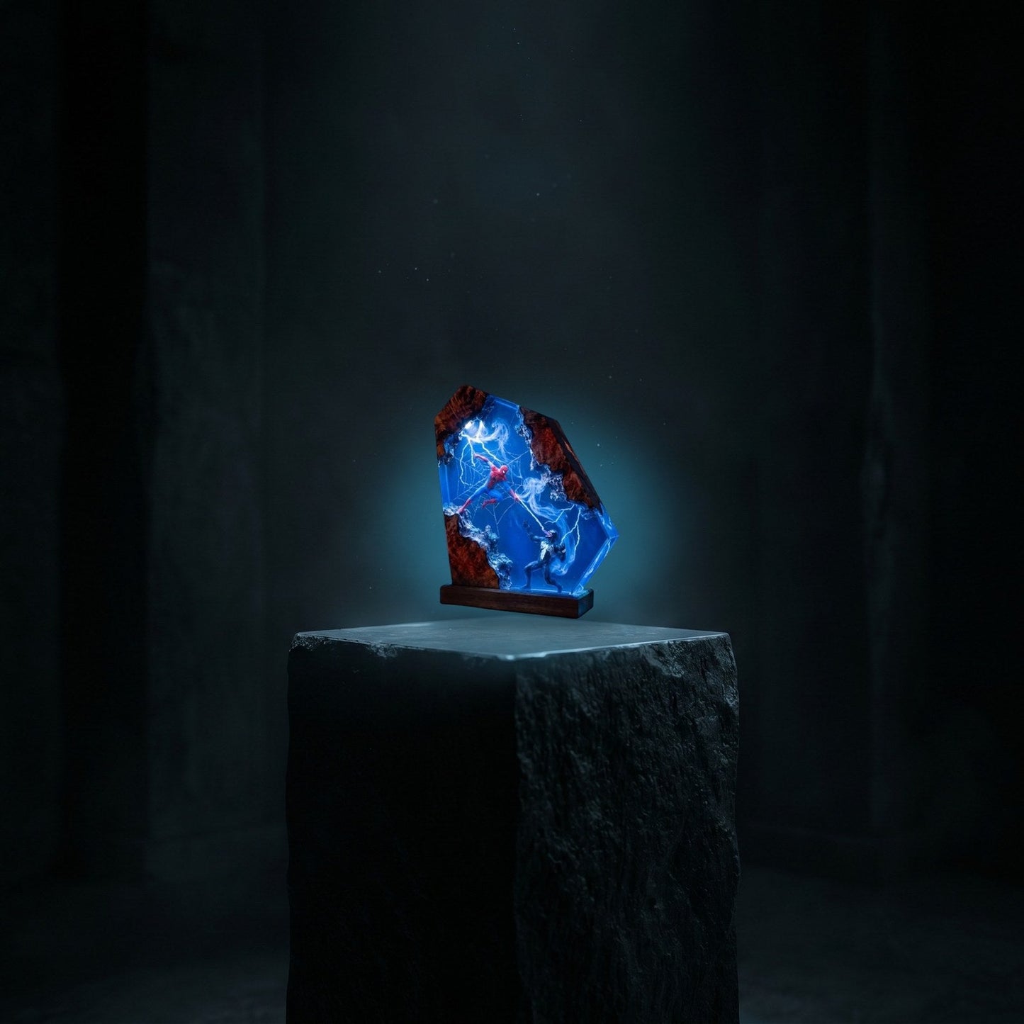 Resylume Portal Duel resin lamp displayed on a stone pedestal