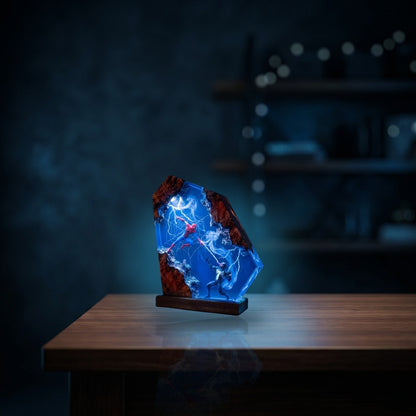 Resylume Portal Duel resin lamp glowing on a living room table